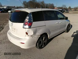2007 Mazda 5 Touring with VIN JM1CR293770157482, listed as a IAAI auction lot 41482451 with 220,195 mi miles and . Bid and sale history available at DreamBid. Image 4.