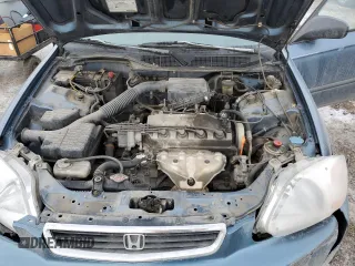 1996 Honda Civic z VIN 1HGEJ6638TL802808, wystawiony jako Copart lot #88307755 z przebiegiem 243 355 mil mil oraz Czysty tytuł • Clean title. Historia ofert i sprzedaży dostępna na DreamBid. Obrazek 11.