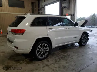 2017 Jeep Grand Cherokee Overland with VIN 1C4RJECG9HC965752, listed as a Copart auction lot 83874784 with 106,604 mi miles and Salvage Title. Bid and sale history available at carsss.com. Image 3.