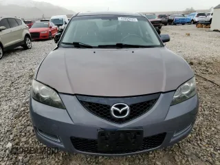 2007 Mazda 3 S Touring with VIN JM1BK324X71732287, listed as a Copart auction lot 43969525 with 211,566 mi miles and Salvage Title. Bid and sale history available at DreamBid. Image 5.