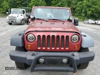 2012 Jeep Wrangler Sport with VIN 1C4AJWAGXCL173771, listed as a Copart auction lot 60336455 with 202,833 mi miles and Clean title. Bid and sale history available at DreamBid. Image 5.