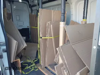 2019 Ford Transit Cargo with VIN 1FTBW3XM2KKB40981, listed as a IAAI auction lot 41558356 with 154,624 mi miles and . Bid and sale history available at DreamBid. Image 8.
