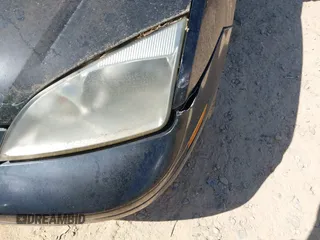 2006 Ford Focus S z VIN 1FAFP31N76W249134, wystawiony jako IAAI lot #41951073 z przebiegiem 152 065 mil mil oraz . Historia ofert i sprzedaży dostępna na DreamBid. Obrazek 17.