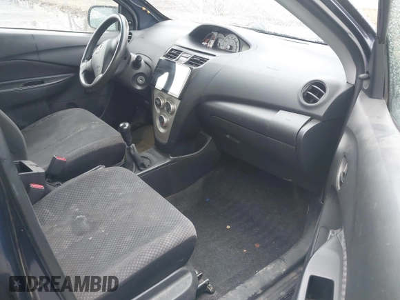 2007 Toyota Yaris with VIN JTDBT923171035002, listed as a IAAI auction lot 41810423 with 252,669 mi miles. Bid and sale history available at carsss.com. Image 5.