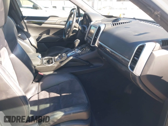 2013 Porsche Cayenne GTS with VIN WP1AD2A22DLA71143, listed as a IAAI auction lot 41287138 with 143,434 mi miles and . Bid and sale history available at DreamBid. Image 5.