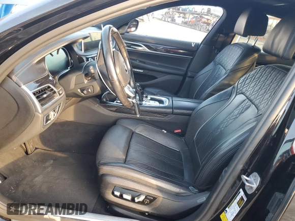 2018 BMW 7 Series 750i with VIN WBA7F0C5XJGM22674, listed as a Copart auction lot 74833524 with 0 mi miles and Salvage Title. Bid and sale history available at carsss.com. Image 7.