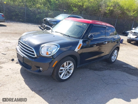 2014 MINI Cooper Paceman with VIN WMWSS1C51EWN94518, listed as a IAAI auction lot 41986247 with 175,940 mi miles. Bid and sale history available at carsss.com. Image 2.