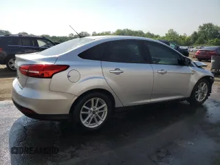 2015 Ford Focus SE with VIN 1FADP3F2XFL321208, listed as a Copart auction lot 61413005 with 139,439 mi miles and Salvage title. Bid and sale history available at DreamBid. Image 3.