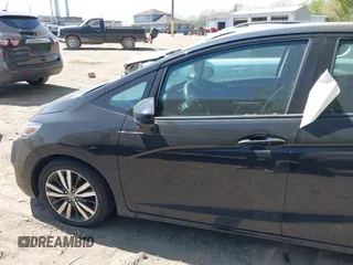 2015 Honda Fit EX-L with VIN 3HGGK5H88FM757753, listed as a IAAI auction lot 42096497 with 121,863 mi miles and . Bid and sale history available at DreamBid. Image 14.