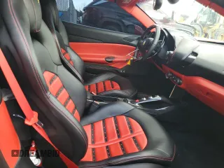 2017 Ferrari 488 z VIN ZFF80AMA6H0228173, wystawiony jako Copart lot #77401204 z przebiegiem 16 556 mil mil oraz Tytuł czysty. Historia ofert i sprzedaży dostępna na DreamBid. Obrazek 10.