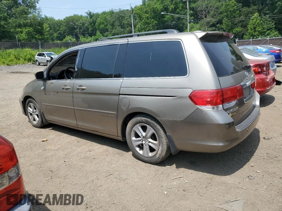 2008 Honda Odyssey Touring z VIN 5FNRL38968B025520, wystawiony jako Copart lot #60799645 z przebiegiem 116 592 mil mil oraz Szkoda całkowita • Salvage title. Historia ofert i sprzedaży dostępna na DreamBid. Obrazek 2.