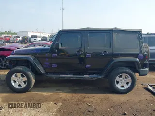 2014 Jeep Wrangler Unlimited Sahara with VIN 1C4BJWEG6EL217945, listed as a IAAI auction lot 42388477 with 61,739 mi miles and . Bid and sale history available at DreamBid. Image 15.