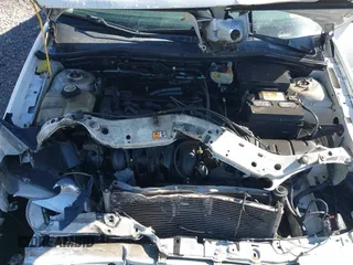 2007 Ford Focus S z VIN 1FAFP34N37W319953, wystawiony jako IAAI lot #41737822 z przebiegiem 208 801 mil mil oraz . Historia ofert i sprzedaży dostępna na DreamBid. Obrazek 10.