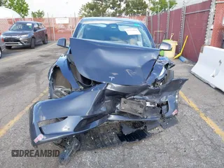 2023 Tesla Model Y Long Range with VIN 7SAYGDEE7PA192488, listed as a IAAI auction lot 42233466 with Not provided miles and . Bid and sale history available at DreamBid. Image 13.