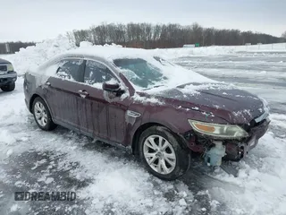 2011 Ford Taurus SEL with VIN 1FAHP2EW4BG115630, listed as a IAAI auction lot 41276945 with 166,867 mi miles. Bid and sale history available at carsss.com. Image 1.