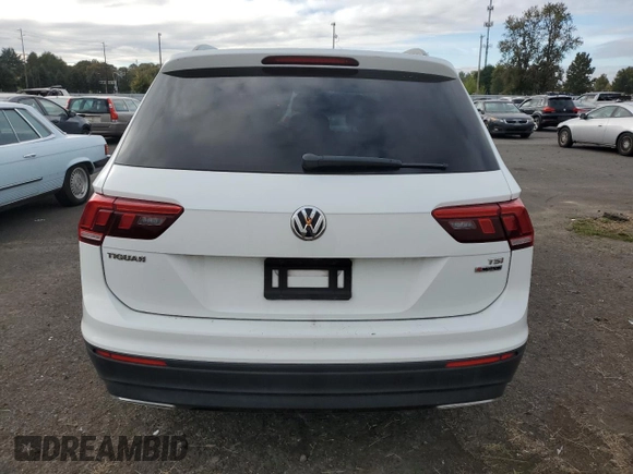 2018 Volkswagen Tiguan S with VIN 3VV0B7AX6JM111232, listed as a Copart auction lot 74944624 with 106,979 mi miles and Salvage Title. Bid and sale history available at DreamBid. Image 6.