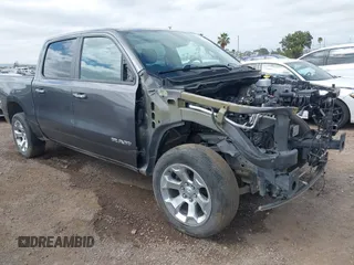2019 Ram 1500 Big Horn z VIN 1C6RREFT3KN601556, wystawiony jako IAAI lot #41862219 z przebiegiem 110 706 mil mil oraz . Historia ofert i sprzedaży dostępna na DreamBid. Obrazek 1.