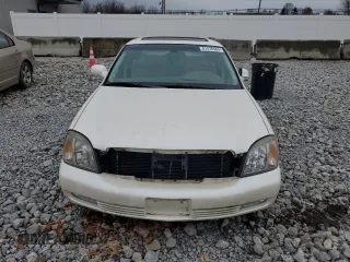 2000 Cadillac DeVille DTS z VIN 1G6KF5797YU263599, wystawiony jako Copart lot #81576484 z przebiegiem 118 414 mil mil oraz Szkoda całkowita • Salvage title. Historia ofert i sprzedaży dostępna na DreamBid. Obrazek 5.