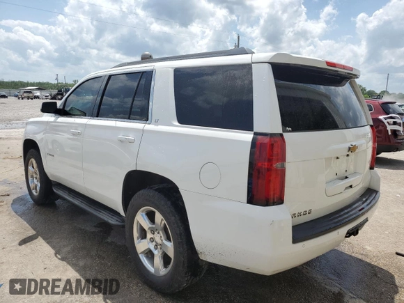 2015 Chevrolet Tahoe LT with VIN 1GNSCBKC8FR181394, listed as a Copart auction lot 53846435 with 191,875 mi miles and Salvage title. Bid and sale history available at DreamBid. Image 2.