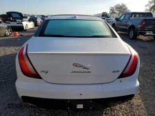 2016 Jaguar XJ with VIN SAJWA1CE4GMV91734, listed as a Copart auction lot 81005144 with 31,924 mi miles and Salvage Title. Bid and sale history available at DreamBid. Image 6.