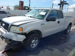 2007 Ford F-150 STX with VIN 1FTRX14W87KC40659, listed as a IAAI auction lot 41423345 with 145,811 mi miles. Bid and sale history available at carsss.com. Image 18.