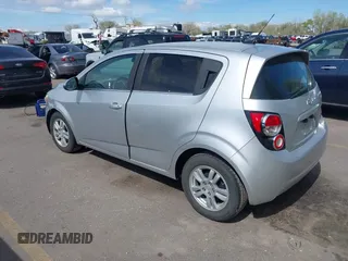 2013 Chevrolet Sonic LT with VIN 1G1JC6SG5D4210853, listed as a IAAI auction lot 42078806 with 135,837 mi miles. Bid and sale history available at carsss.com. Image 3.