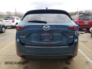 2018 Mazda CX-5 Grand Touring with VIN JM3KFADM8J1351624, listed as a Copart auction lot 50965465 with 66,210 mi miles and Salvage Title. Bid and sale history available at DreamBid. Image 6.
