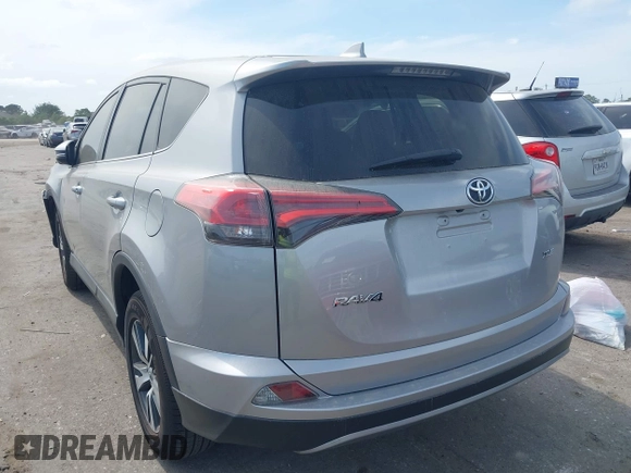2018 Toyota RAV4 XLE z VIN 2T3WFREV5JW466294, wystawiony jako IAAI lot #41841436 z przebiegiem 132 150 mil mil oraz . Historia ofert i sprzedaży dostępna na DreamBid. Obrazek 3.
