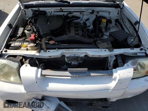 2001 Nissan Frontier XE with VIN 1N6DD26S71C385578, listed as a Copart auction lot 59875405 with 73,936 mi miles and Salvage title. Bid and sale history available at DreamBid. Image 11.