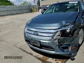 2012 Ford Fusion Hybrid z VIN 3FADP0L3XCR176552, wystawiony jako Copart lot #55787415 z przebiegiem 156 806 mil mil oraz Szkoda całkowita • Salvage title. Historia ofert i sprzedaży dostępna na DreamBid. Obrazek 13.