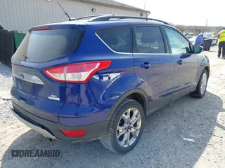 2013 Ford Escape SEL with VIN 1FMCU0H94DUC84666, listed as a IAAI auction lot 42001644 with 165,269 mi miles. Bid and sale history available at carsss.com. Image 4.