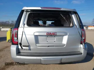 2020 GMC Yukon SLT Standard Edition with VIN 1GKS2DKCXLR294027, listed as a IAAI auction lot 41004965 with 69,161 mi miles. Bid and sale history available at carsss.com. Image 16.