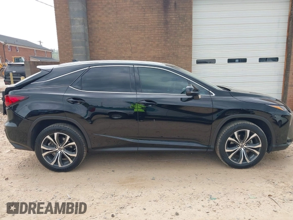 2019 Lexus RX with VIN 2T2ZZMCA6KC150398, listed as a IAAI auction lot 42080027 with 68,598 mi miles. Bid and sale history available at carsss.com. Image 13.