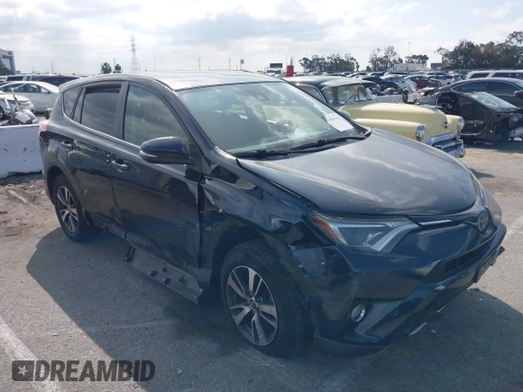 2017 Toyota RAV4 XLE with VIN JTMWFREV3HD105878, listed as a IAAI auction lot 41889338 with 75,784 mi miles. Bid and sale history available at carsss.com. Image 1.