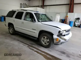 2001 Chevrolet Tahoe LT with VIN 1GNEC13T01R128767, listed as a Copart auction lot 71545634 with 307,271 mi miles and Salvage Title. Bid and sale history available at carsss.com. Image 4.