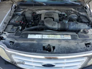 1999 Ford F-150 XL with VIN 1FTRF17L7XNA73732, listed as a Copart auction lot 74388514 with Not provided miles and Clean title. Bid and sale history available at DreamBid. Image 11.
