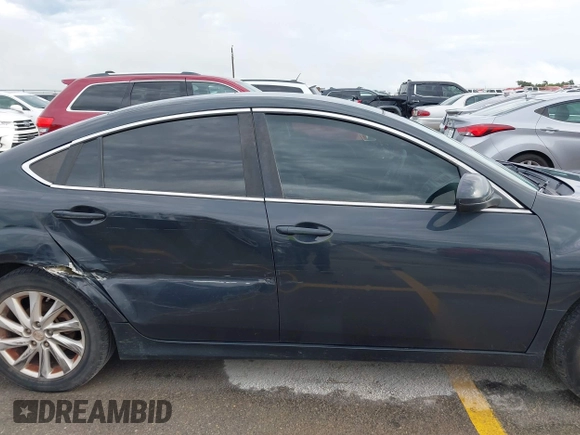2012 Mazda 6 i Touring with VIN 1YVHZ8DH4C5M23169, listed as a IAAI auction lot 42467120 with 202,560 mi miles and . Bid and sale history available at DreamBid. Image 13.