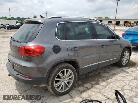 2012 Volkswagen Tiguan SE z VIN WVGAV7AX4CW001417, wystawiony jako Copart lot #61105865 z przebiegiem 168 110 mil mil oraz Czysty tytuł • Clean title. Historia ofert i sprzedaży dostępna na DreamBid. Obrazek 3.