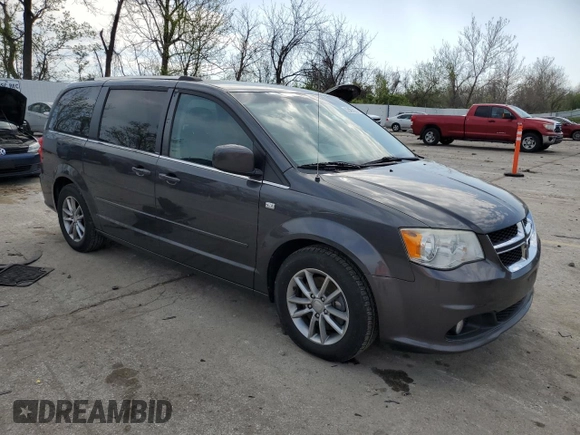 2014 Dodge Grand Caravan SXT 30th Anniversary with VIN 2C4RDGCG4ER285294, listed as a Copart auction lot 52109205 with 196,331 mi miles and Salvage Title. Bid and sale history available at DreamBid. Image 4.