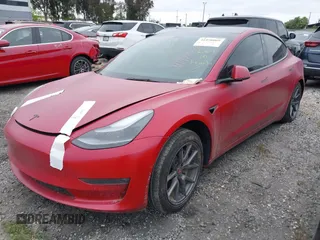 2022 Tesla Model 3 Long Range with VIN 5YJ3E1EB3NF273540, listed as a IAAI auction lot 41978069 with 27,247 mi miles and . Bid and sale history available at DreamBid. Image 2.