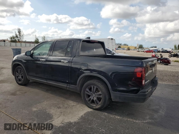 2019 Honda Ridgeline Sport with VIN 5FPYK2F15KB003142, listed as a Copart auction lot 57058235 with 173,049 mi miles and Clean title. Bid and sale history available at DreamBid. Image 2.