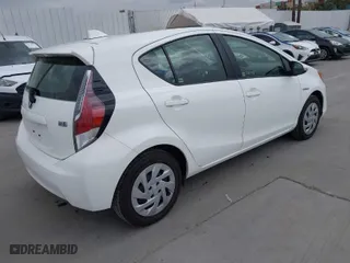 2016 Toyota Prius c One with VIN JTDKDTB38G1121451, listed as a IAAI auction lot 42040833 with 68,851 mi miles. Bid and sale history available at carsss.com. Image 4.