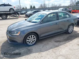 2013 Volkswagen Jetta Sedan SE with VIN 3VWDP7AJ0DM280614, listed as a IAAI auction lot 41882868 with 142,363 mi miles. Bid and sale history available at carsss.com. Image 2.