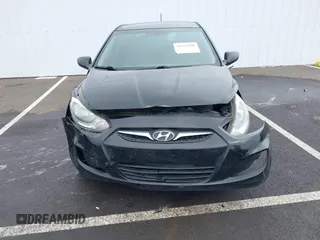 2012 Hyundai Accent SE with VIN KMHCU5AE1CU035390, listed as a IAAI auction lot 41765900 with 127,685 mi miles. Bid and sale history available at carsss.com. Image 12.