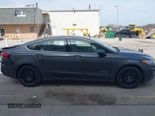 2019 Ford Fusion Hybrid SE with VIN 3FA6P0LU6KR163927, listed as a IAAI auction lot 41834612 with 104,342 mi miles. Bid and sale history available at carsss.com. Image 14.