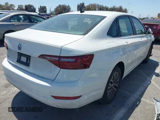 2021 Volkswagen Jetta S z VIN 3VWC57BU4MM037088, wystawiony jako IAAI lot #42087111 z przebiegiem 82 728 mil mil oraz . Historia ofert i sprzedaży dostępna na DreamBid. Obrazek 4.