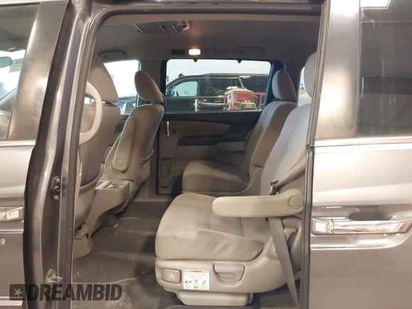 2016 Honda Odyssey SE with VIN 5FNRL5H38GB039652, listed as a IAAI auction lot 41985520 with Not Provided miles and . Bid and sale history available at DreamBid. Image 8.