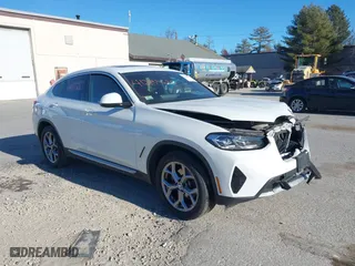 2022 BMW X4 xDrive30i with VIN 5UX33DT06N9M76214, listed as a IAAI auction lot 41285650 with 29,638 mi miles. Bid and sale history available at carsss.com. Image 1.