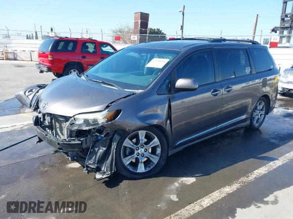2012 Toyota Sienna SE with VIN 5TDXK3DCXCS233593, listed as a IAAI auction lot 41959611 with 85,558 mi miles. Bid and sale history available at carsss.com. Image 2.