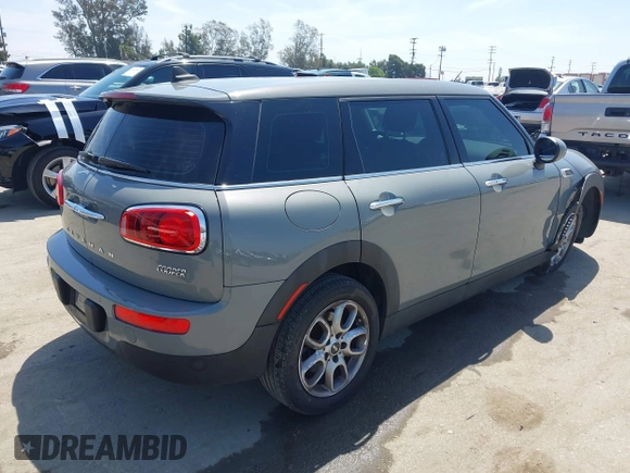 2019 MINI Clubman Cooper with VIN WMWLN5C57K2E34894, listed as a IAAI auction lot 42072962 with 49,274 mi miles and . Bid and sale history available at DreamBid. Image 4.